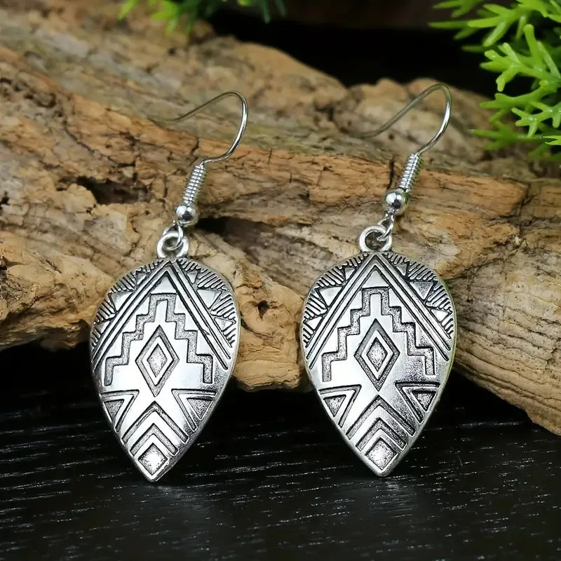 1 Pair of Vintage Earrings   1 Necklace Jewelry Set - Retro Carved Surface, Tribal Inspired, Durable, and Stylish Accessories