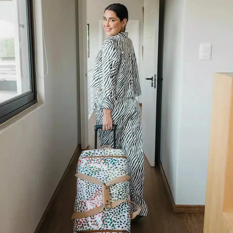 Thandana Laminated Fabric Wheeled Duffel Bag | Cheetah Preppy