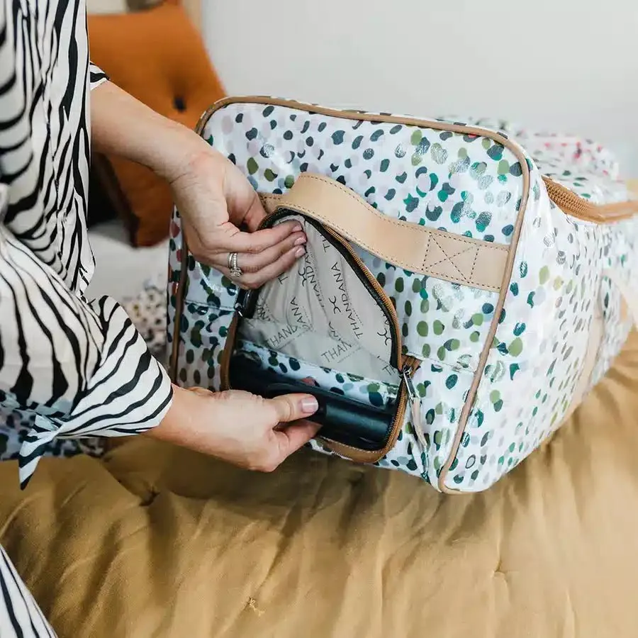 Thandana Laminated Fabric Wheeled Duffel Bag | Cheetah Preppy