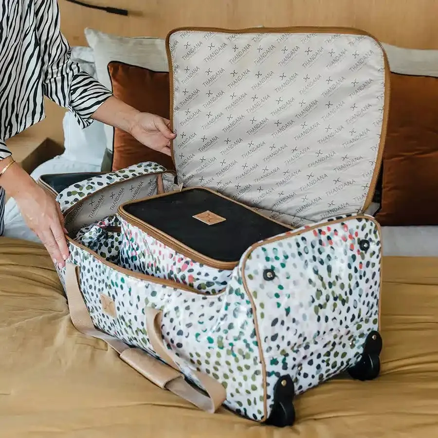 Thandana Laminated Fabric Wheeled Duffel Bag | Cheetah Preppy
